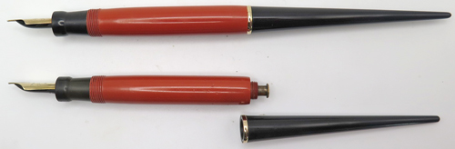 ITEM #6852 6797 6798: PARKER BLACK CERAMIC DESK BASE + FOUNTAIN PENS. HOLDS TWO PENS. BLACK SOCKETS HAVE DOUBLE BAND AND BRASS SOCKETS. GREAT CONDITION. 